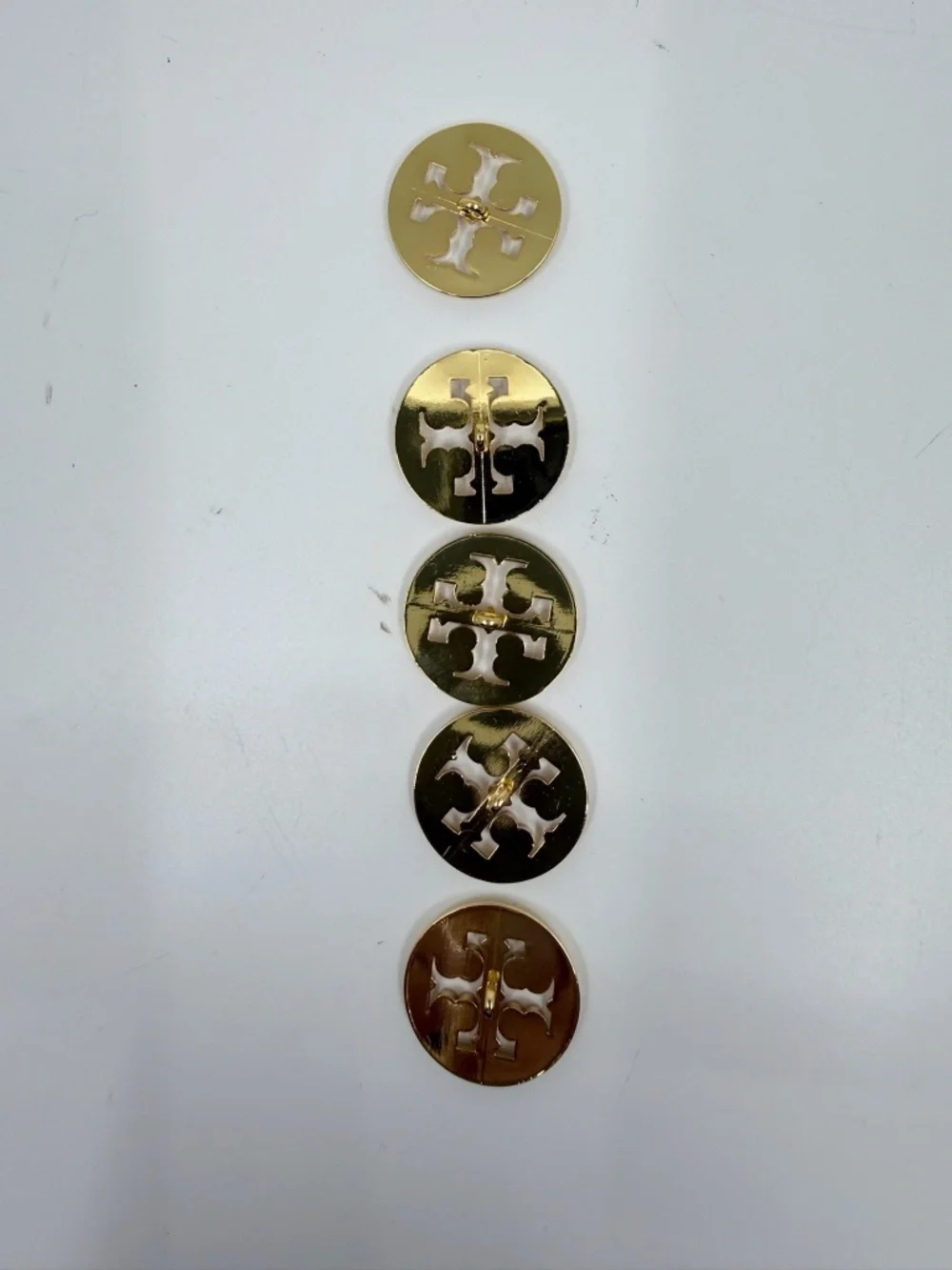 Five Gold Finish Tory Burch Buttons